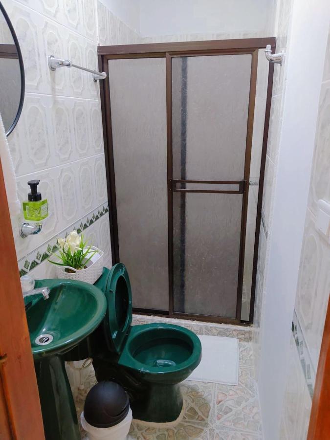 Confortable Habitacion En Apartamento Amoblado Jardin Exterior foto